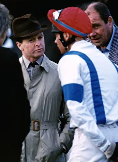 00393 Prints: Racehorse Trainer Jonjo O Neil talking with a jockey after a race. Circa 1991