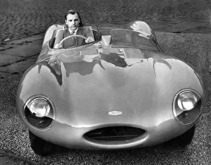 Jaguar Prints: Racing driver Brian Naylor seen here behind the wheel of a D-type Jaguar