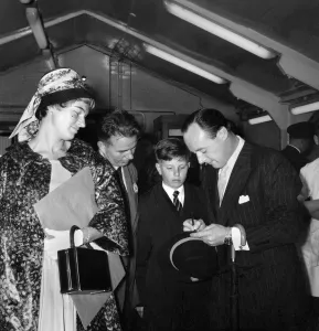 Racing driver and speed king Donald Campbell seen here with his wife at London Airport