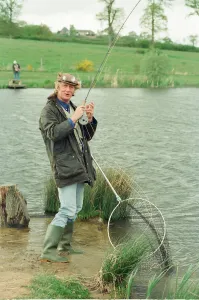 Radio Disc Jockey Chris Tarrant enjoying a spot of fishing in his spare time