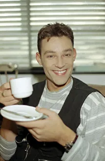 Radio DJ Toby Anstis drinking a cup of tea at The BBC in the Childrens BBC studio