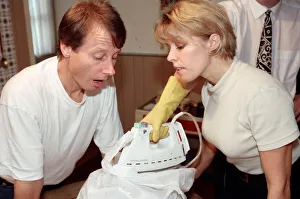 Radio WM presenters Tony Wadsworth and Julie Mayer pictured with an iron