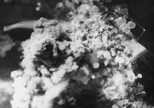 Air Raids Prints: RAF attack on Heligoland. The airfield on the island of Dune disappearing under a
