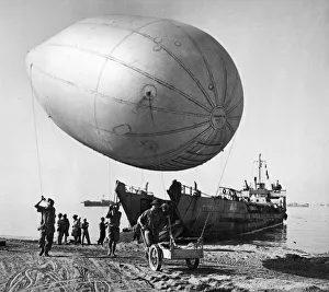 01459 Prints: RAF Balloon Barrage men were among the first Allied troops to land on the beaches