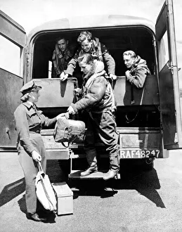 00189 Prints: RAF crews arrive at their dispersal point driven by a WaF officer who lends a hand with