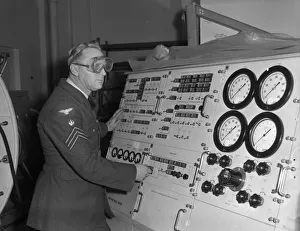 Norfolk Prints: RAF Technician runs a tests on the Rocketdyne propulsion unit for a Thor intermediate