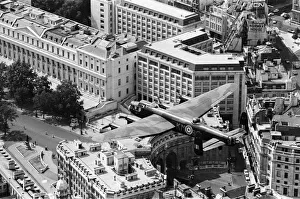 Avro Prints: The RAFs only Lancaster bomber pictured in flight over Central London