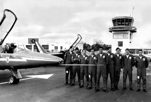Aerobatics Prints: The RAFs Red Arrows aerobactic team burst into the sky above Newcastle Airport with