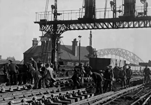 Railway platelayers making alterations at Newcastle railway crossings on 26th October