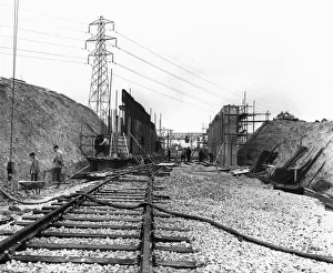 Construction Worker Prints: Railway sidings for the Halewood Ford factory are seen here under construction
