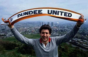 00243 Prints: Ralph Milne waving Dundee United scarf January 1987