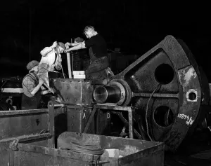 Welsh Prints: Ramming sand in preparation for the special welding operation used to repair the broken