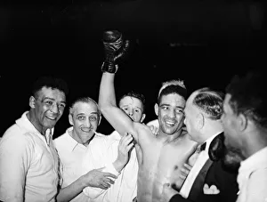 01511 Prints: Randolph Turpin and his corner team celebrate his win over Sugar Ray Robinson following