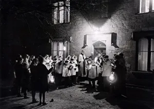 Carol Singers Prints: Randwick church choir Gloucestershire outside the home of Mr & Mrs W L Paul of Randwick