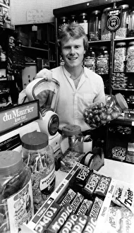 Sweets Prints: Rangers FC player Dave MacKinnon puts in some time in his shop in Renfrew after training