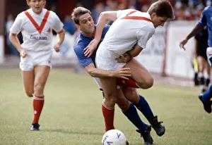 Hearts Prints: Rangers footballer Kevin Drinkell in a tangle with a player from Airdrieonians during