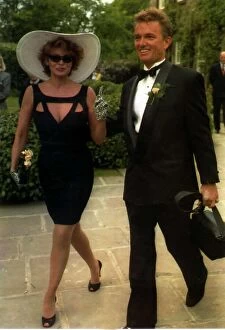 Images Dated 5th June 1991: Raquel Welch Actress with boyfriend Bob Moore arriving for her sons wedding