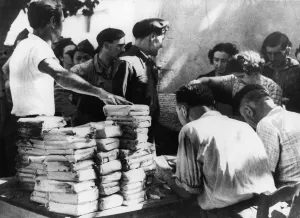 Rations abandoned by the retreating Germans in Southern France being distributed to