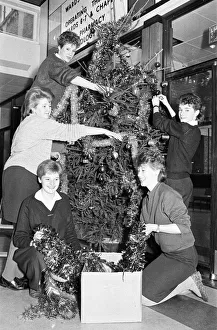 00523 Prints: Rawthorpe High School pupils decorating the Christmas Tree in the entrance to St Luke