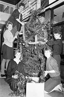 00523 Prints: Rawthorpe High School pupils decorating the Christmas Tree in the entrance to St Luke