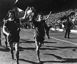 01130 Prints: Ray Clemence and Larry Lloyd of Liverpool parade the League Championship trophy following