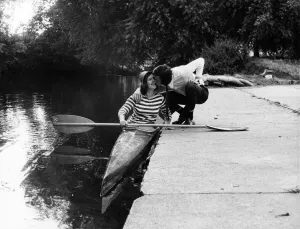 Paddle Prints: Ray Haynes kisses his wife Janice goodbye as she sets off to paddle to work from Windsor