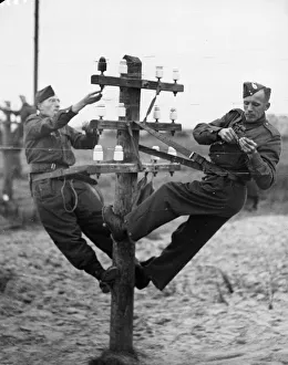 RCS men in training. Erecting outside telegraphic communications and wiring