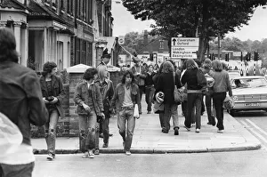 Reading pop festival goers seen here making their way alongCaversham Road
