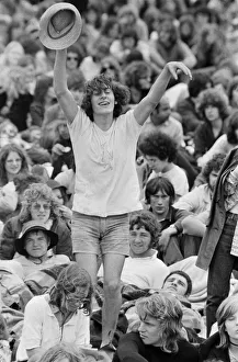 Hippy Prints: Reading Pop Festival. A happy Music fan watching the bands performing on the main