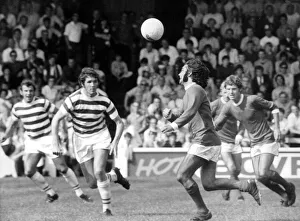 00230 Prints: Reading v. Manchester United. Danger for Reading as George Best heads on a pass
