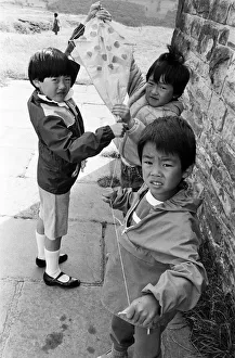 Kites Prints: Ready for take off-these youngsters were among a group of some 25 children flying home