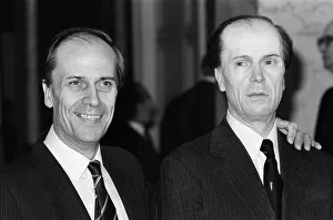 01389 Prints: The real Norman Tebbit stands with a wax work of himself at a preview of his wax portrait