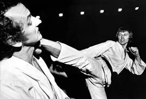 On the receiving end is Karate black belt expert Jeff Barwick