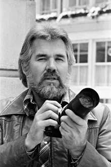 01373 Prints: Recording star Kenny Rogers, a keen amateur photographer, pictured in London