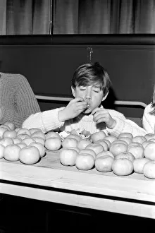 Records: Humour: Children: Meet Guenter Kuhn the 14 years old world champion orange eater