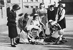 01465 Prints: A Red Cross youth group training at Fairfield Grammar school in Bristol