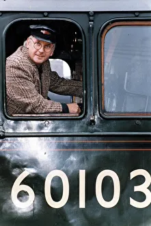 Driving Prints: redbutton Pete Waterman inside the Flying Scotsman which he recently bought