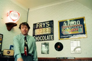 Vintage Prints: Redcar barber Mike Forbes with some of his collection of memorabilia in his shop