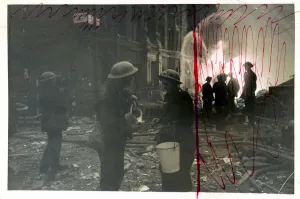 Fires Prints: Refreshments supplied by an A. F. S. girl to men of the Fire Brigade during the blitz MOI