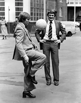 Tricks Prints: Reg Bowden-watched by Fulham centre Mal Aspey-knows his soccer. November 1980 P003657