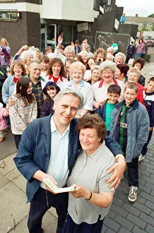 Reg and Jan Anderson get a rousing send off from customers after retiring from their shop