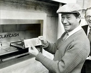 Reg Varney, actor, with Sir Thomas Bland (far right) deputy chairman of Barclays bank