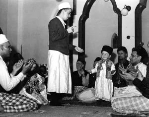 Muslim Prints: Religion Muslim A small boy is initiated into the mosque and the muslim faith