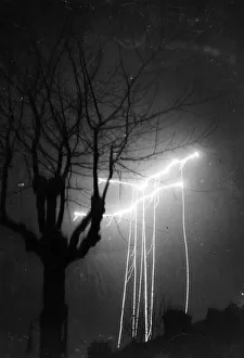 Remarkable picture of parachute flares dropped in London. 29th December 1940