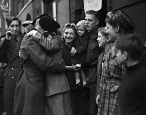 Repatriated wounded soldiers seen here with their families after returning home
