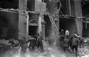 A rescue by the National Fire Service when a flying bomb crashed on flats at Nevern