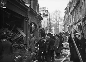 01481 Prints: Rescue workers search through the rubble and wreckage of Warwick Court, Holborn