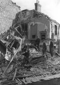 00080 Prints: Rescue workers searching for victims in a Coventry house after the air raid