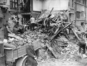 Rescue workers seen here searching through the wreckage of the Police Station in St Mary