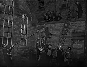 Phoney War Prints: Rescuing a casualty. A series of realistic exercises were carried out at the A. R. P